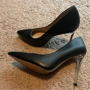 Black shoe with clear heels